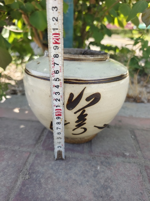古玩陶瓷磁州窯白底褐彩罐真品鑒賞圖