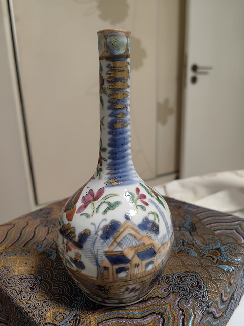 古玩陶瓷廣彩花卉獅子紋天球瓶真品鑒賞圖