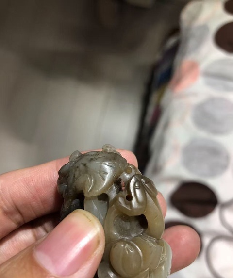 古玩玉器和田玉雕“執荷童子”真品鑒賞圖