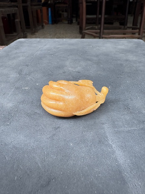 古玩雜項老撾田黃石把臉真品鑒賞圖