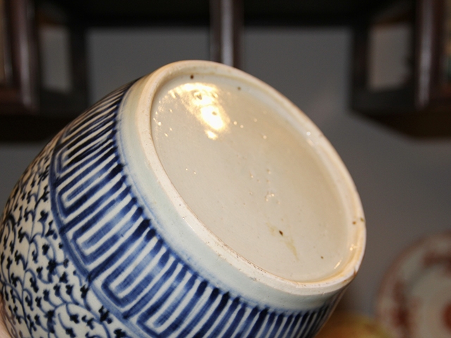 古玩陶瓷花卉紋青花罐真品鑒賞圖