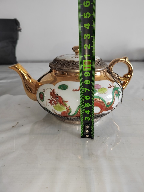 古玩陶瓷粉彩開光龍鳳紋茶壺真品鑒賞圖
