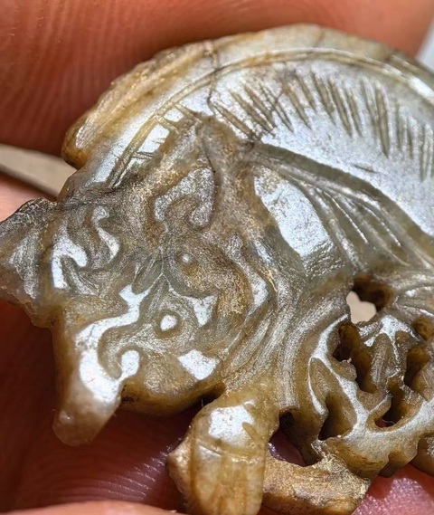古玩雜項(xiàng)獅子滾繡球花片真品鑒賞圖