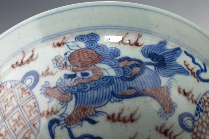 古玩陶瓷清嘉慶·青花釉里紅獅子繡球紋折沿碗拍賣,當(dāng)前價(jià)格3016元