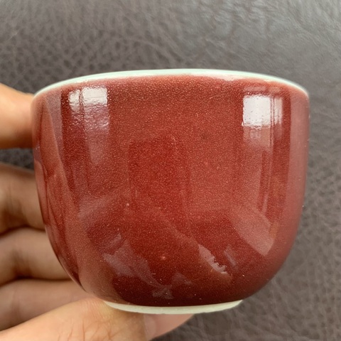 古玩陶瓷紅釉臥足杯真品鑒賞圖