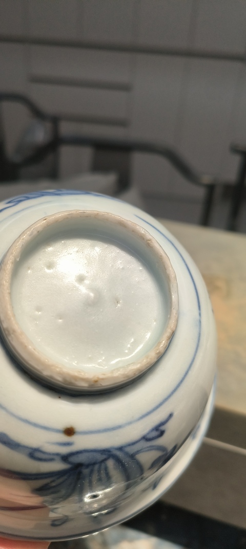 古玩陶瓷晚明青花洞石花卉紋碗真品鑒賞圖