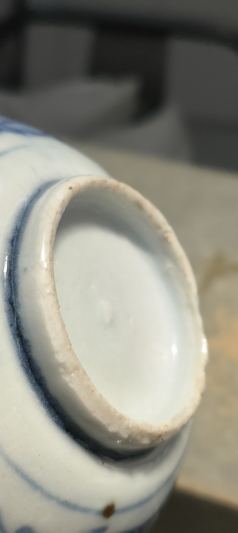 古玩陶瓷晚明青花洞石花卉紋碗真品鑒賞圖