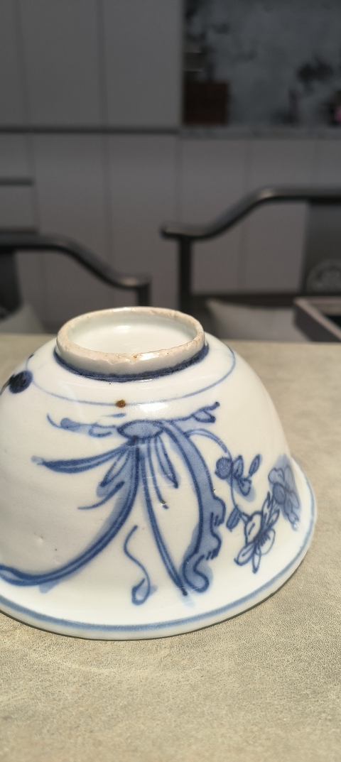 古玩陶瓷晚明青花洞石花卉紋碗真品鑒賞圖