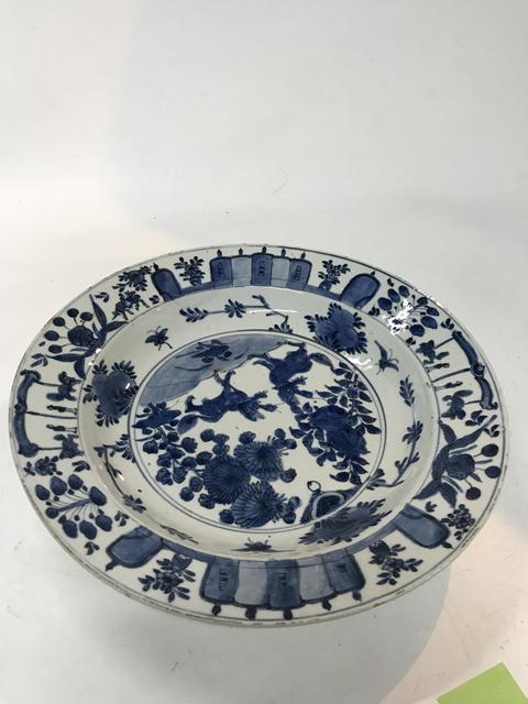 古玩陶瓷瑞獸紋青花盤真品鑒賞圖