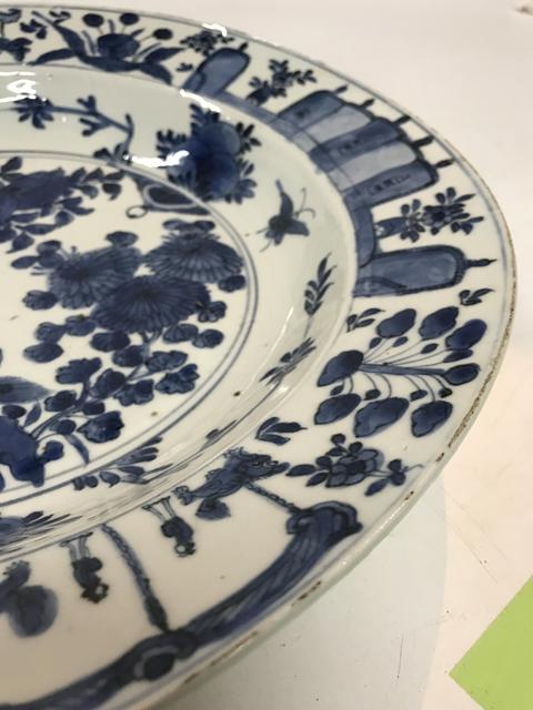 古玩陶瓷瑞獸紋青花盤真品鑒賞圖