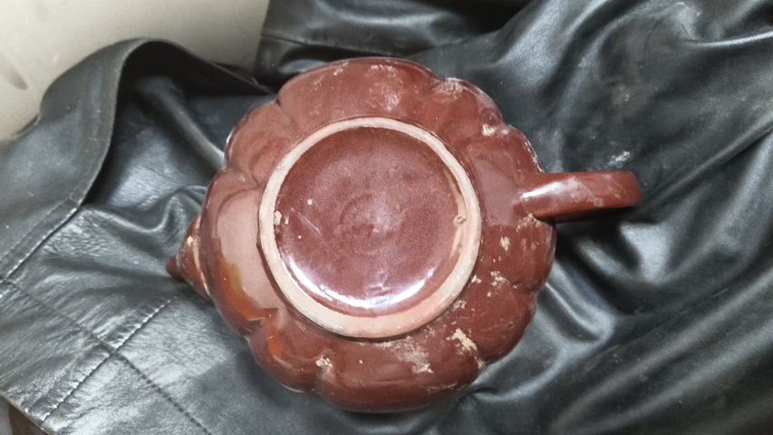 古玩陶瓷創匯時期醬釉瓜棱壺真品鑒賞圖