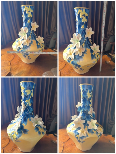 古玩陶瓷花卉紋堆塑瓶真品鑒賞圖
