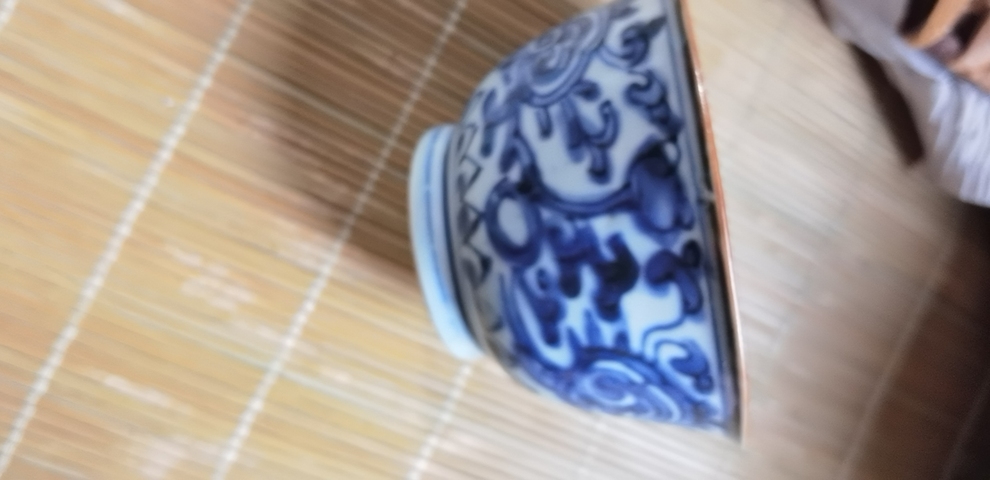 古玩陶瓷花卉紋青花碗真品鑒賞圖