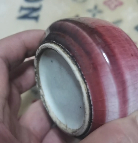 古玩陶瓷紅釉水呈真品鑒賞圖