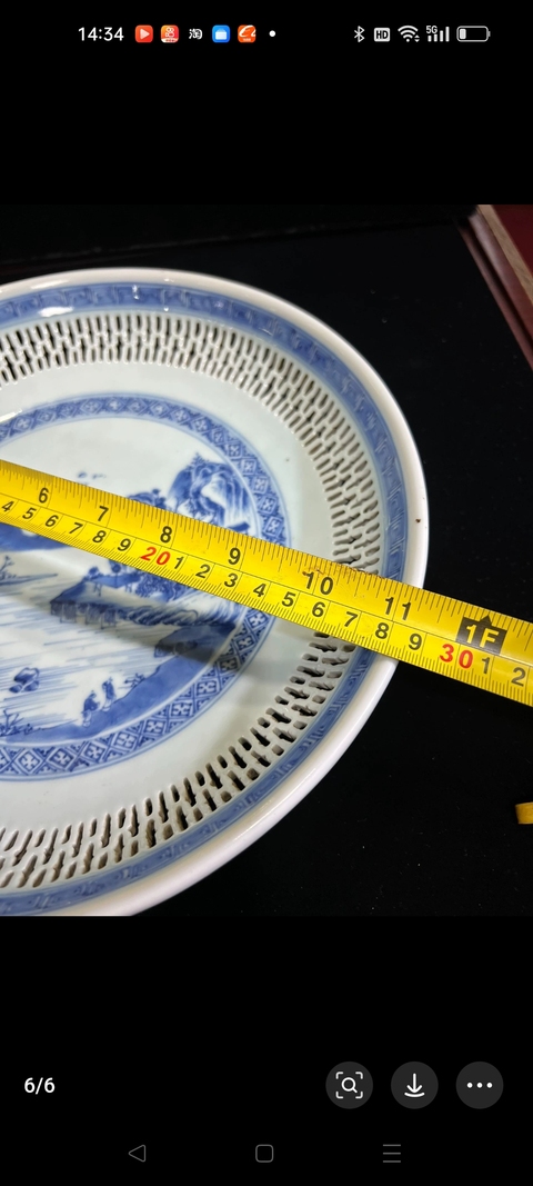 古玩陶瓷山水紋青花鏤空盤真品鑒賞圖