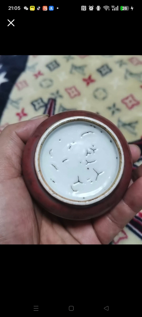 古玩陶瓷紅釉水呈真品鑒賞圖
