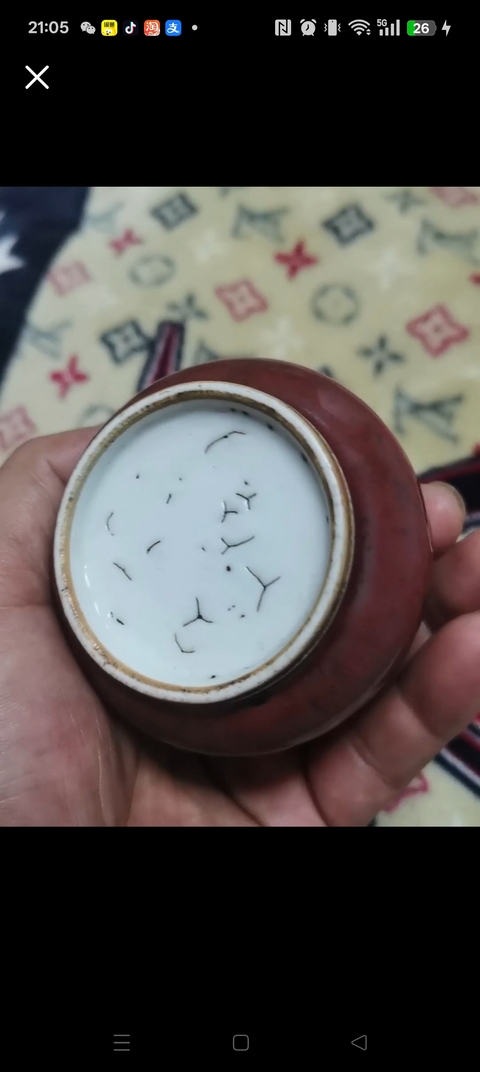 古玩陶瓷紅釉水呈真品鑒賞圖