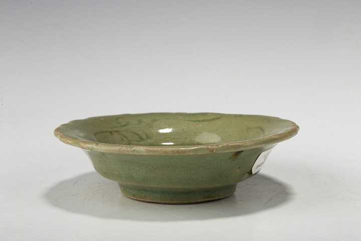 古玩陶瓷明晚·青釉刻花花口盞
真品鑒賞圖