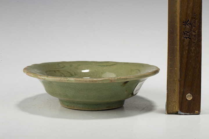 古玩陶瓷明晚·青釉刻花花口盞
真品鑒賞圖