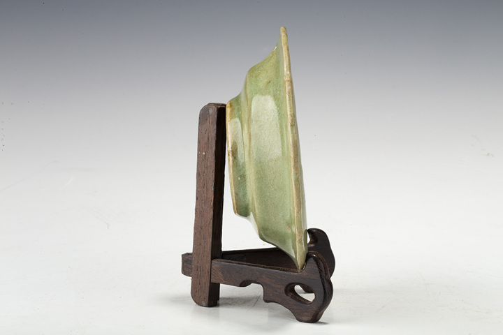 古玩陶瓷明晚·青釉刻花花口盞
真品鑒賞圖