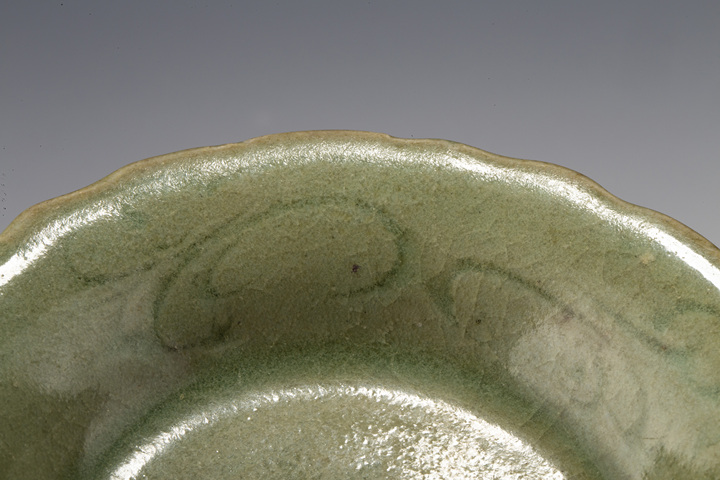 古玩陶瓷明晚·青釉刻花花口盞
真品鑒賞圖