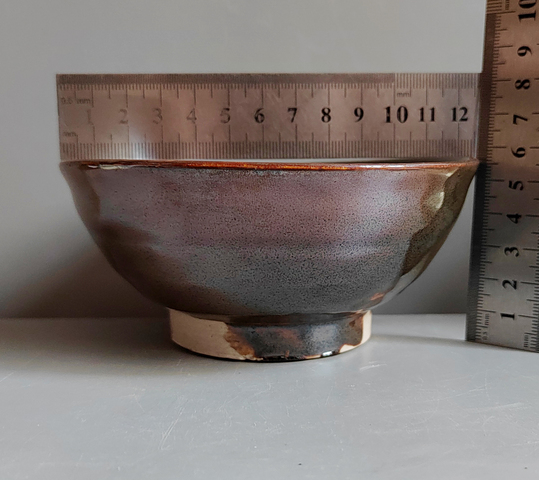 古玩陶瓷窯變黑釉茶碗真品鑒賞圖