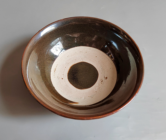 古玩陶瓷窯變黑釉茶碗真品鑒賞圖