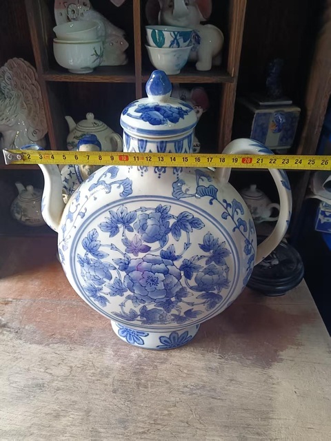 古玩陶瓷花卉紋青花執壺真品鑒賞圖