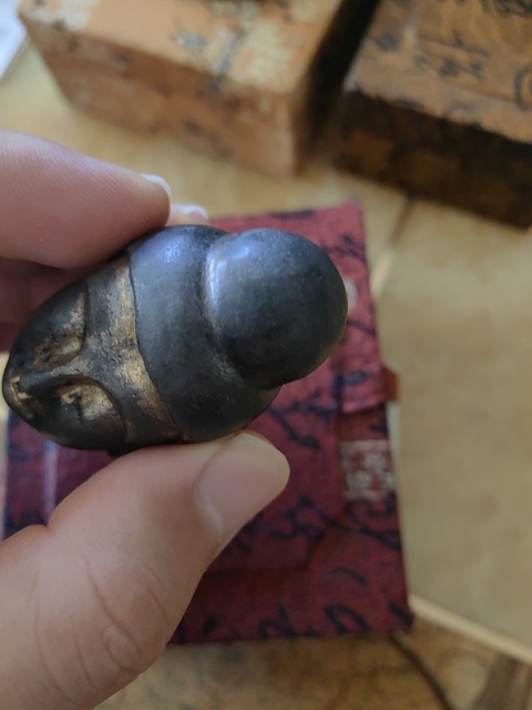 古玩銅器佛首真品鑒賞圖