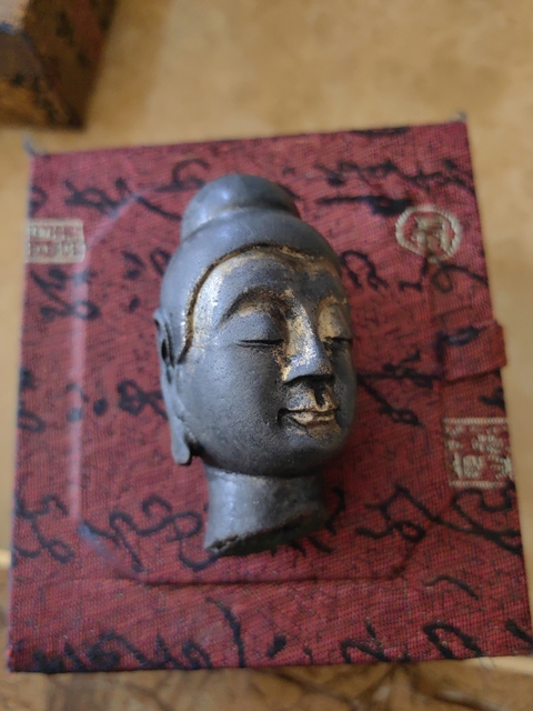 古玩銅器佛首真品鑒賞圖