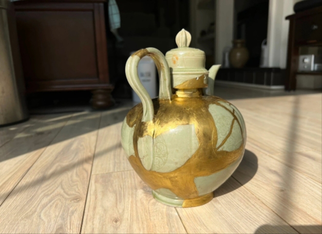 古玩陶瓷青瓷殘壺真品鑒賞圖