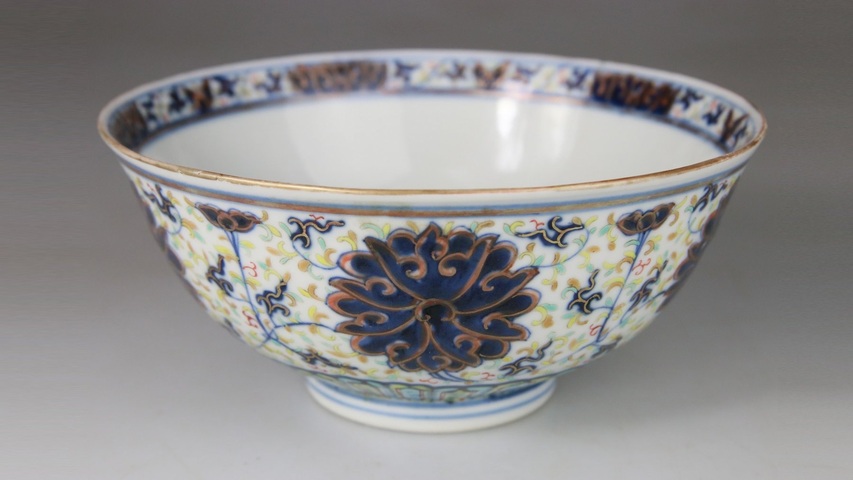 古玩陶瓷青花加彩花卉紋茶碗真品鑒賞圖