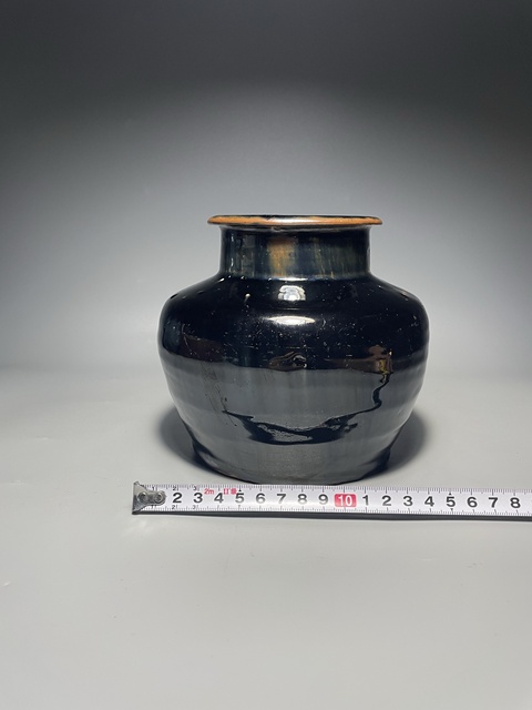 古玩陶瓷窯變黑釉高領(lǐng)罐真品鑒賞圖