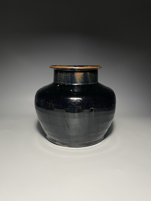古玩陶瓷窯變黑釉高領(lǐng)罐真品鑒賞圖
