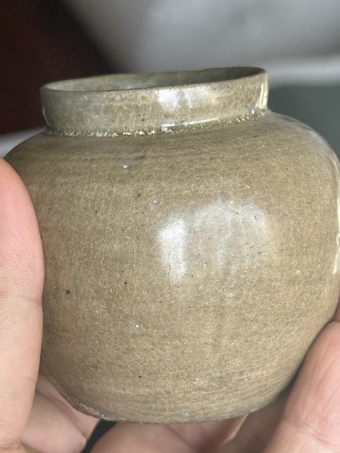 古玩陶瓷五代越窯瓜棱罐真品鑒賞圖