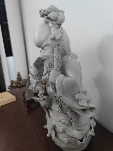 古玩陶瓷白釉壽星造像真品鑒賞圖