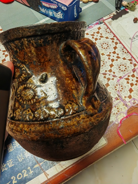 古玩陶瓷褐釉花卉紋花澆真品鑒賞圖