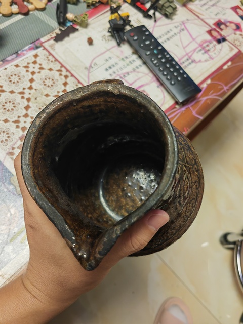 古玩陶瓷褐釉花卉紋花澆真品鑒賞圖