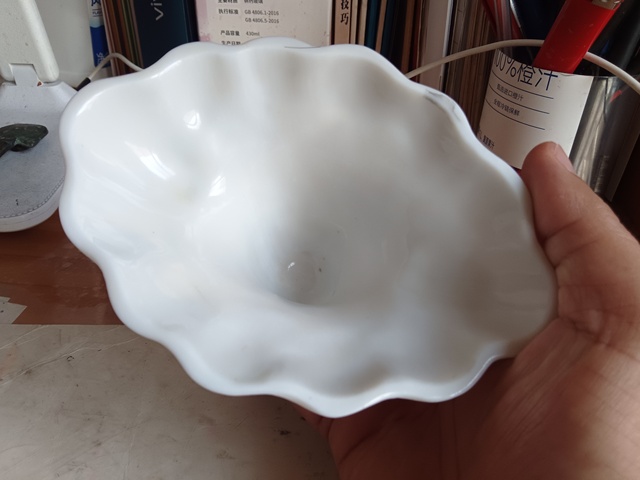 古玩陶瓷明代時期德化窯白釉龍虎杯真品鑒賞圖