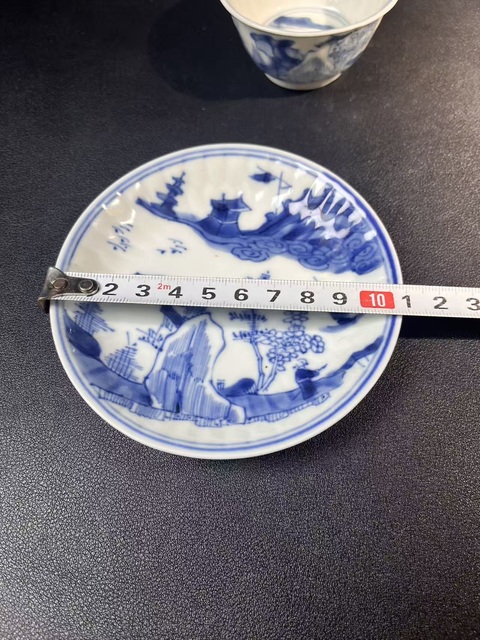 古玩陶瓷山水紋青花杯盤真品鑒賞圖