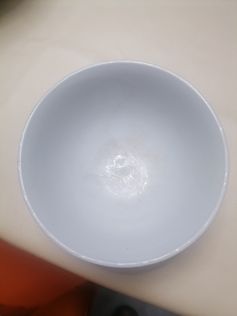 古玩陶瓷藍料彩花卉紋茶碗真品鑒賞圖