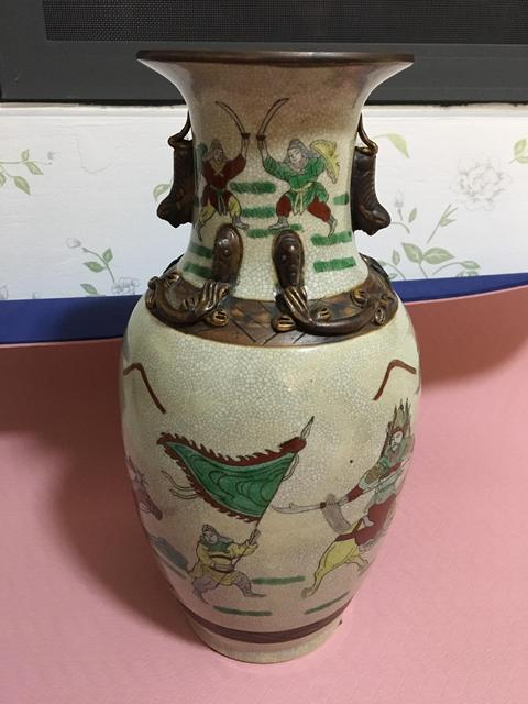 古玩陶瓷哥釉地鐵銹釉刀馬人瓶真品鑒賞圖