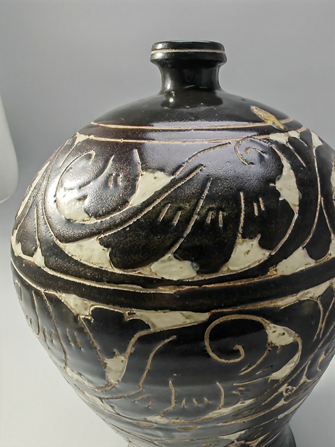 古玩陶瓷剔花梅瓶真品鑒賞圖