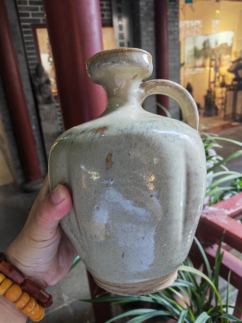 古玩陶瓷華寧窯白釉窯變酒壺真品鑒賞圖