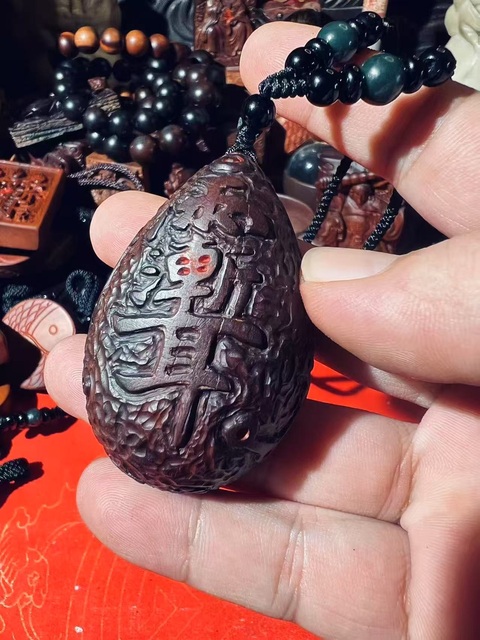 古玩雜項手工雕刻制作棗木掛件真品鑒賞圖