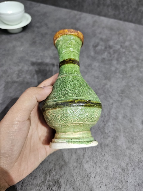 古玩陶瓷三彩花卉紋盤口瓶真品鑒賞圖