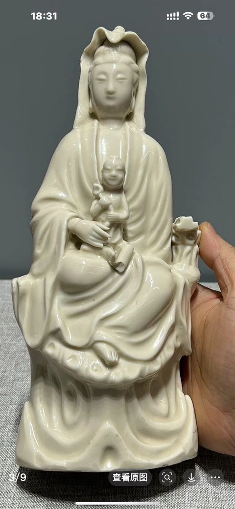 古玩陶瓷明代晚期德化窯白釉送子觀音塑像真品鑒賞圖