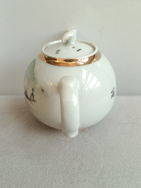 古玩陶瓷淺降彩山水紋茶壺拍賣,當前價格580元