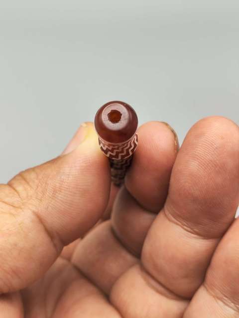 古玩玉器仿鑲蝕紅玉髓管珠真品鑒賞圖
