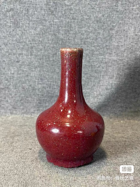 古玩陶瓷窯變紅釉天球瓶真品鑒賞圖